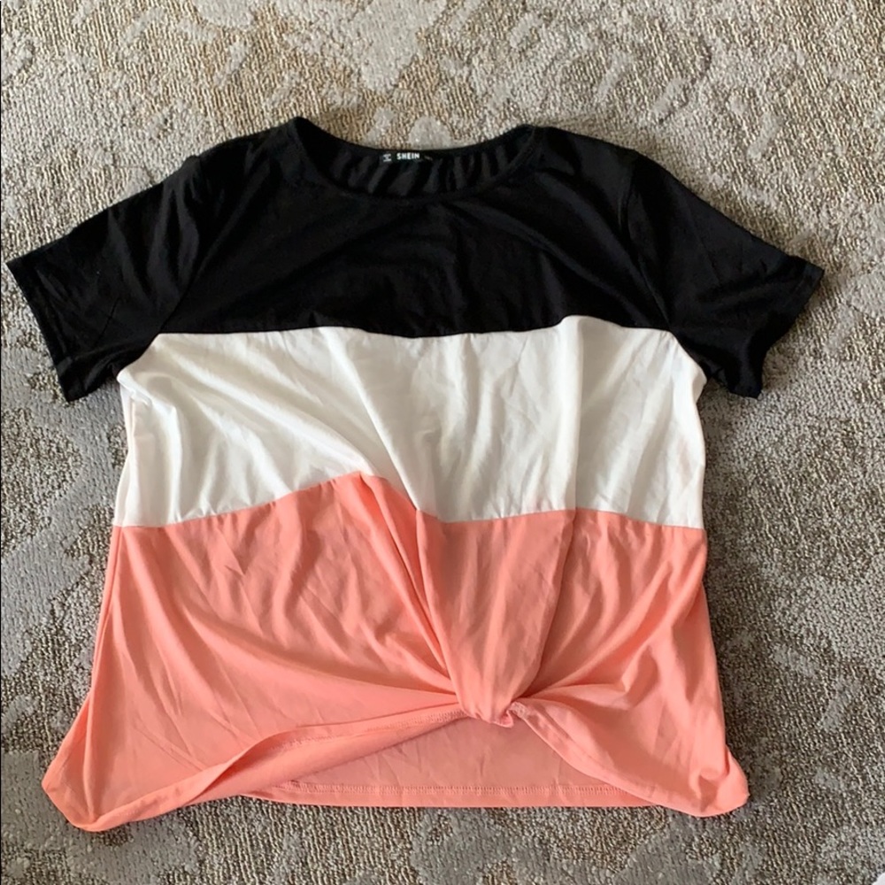 A multi colored short sleeve knotted shirt!